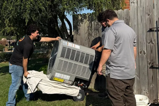 Area Wide Services team installing HVAC equipment