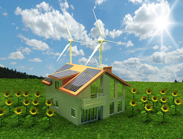 House in the Field with Wind Mill and Solar Panels on The Roof
